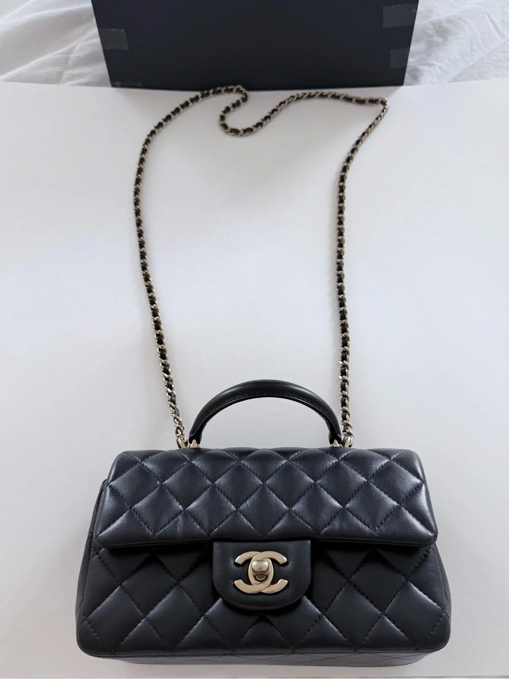 CHANEL Black Quilted Leather Top-Handle Crossbody with Gold-Tone Hardware